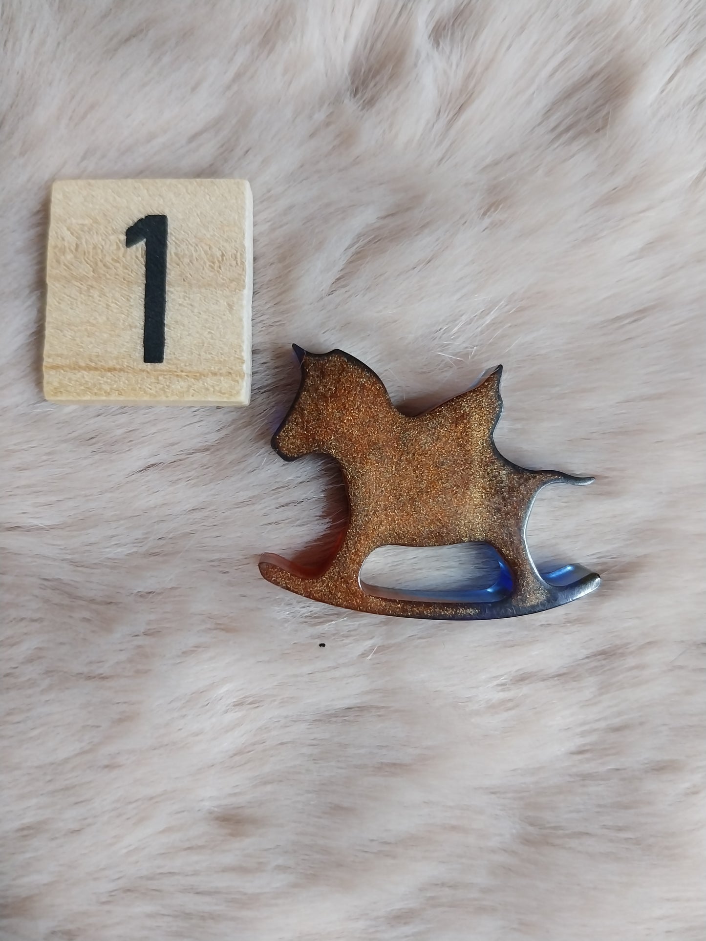 Magnet cheval à bascule