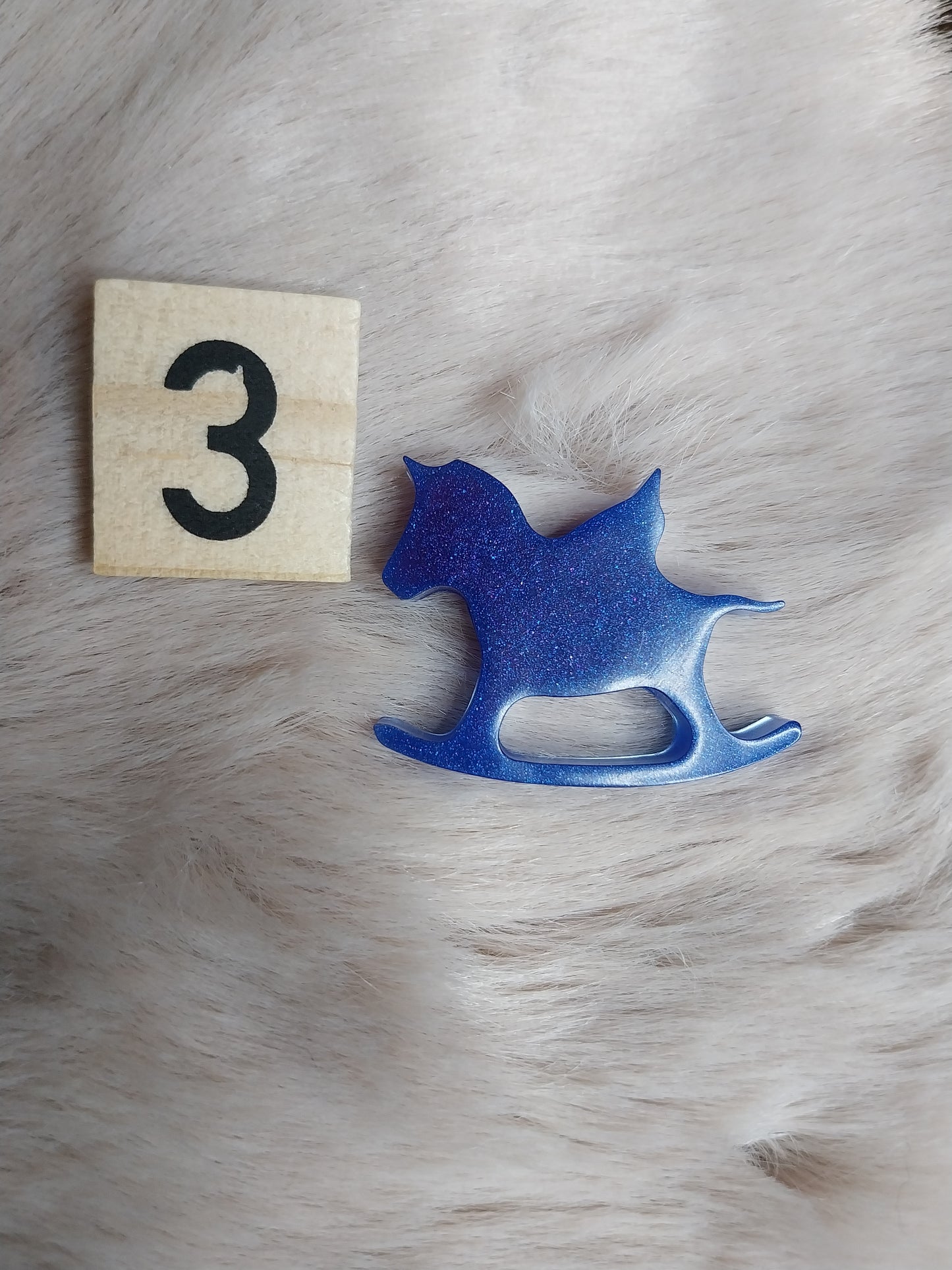 Magnet cheval à bascule