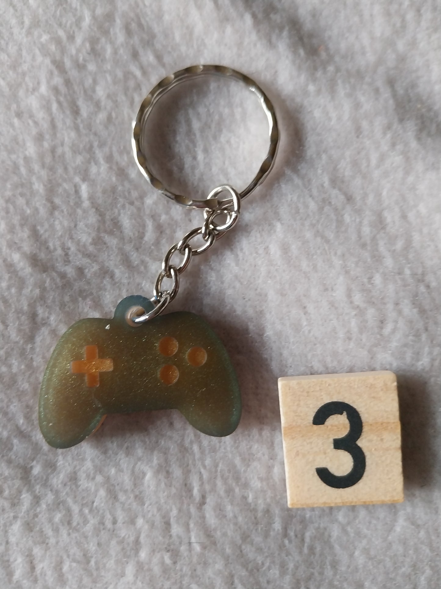 Porte-clefs manette de jeu