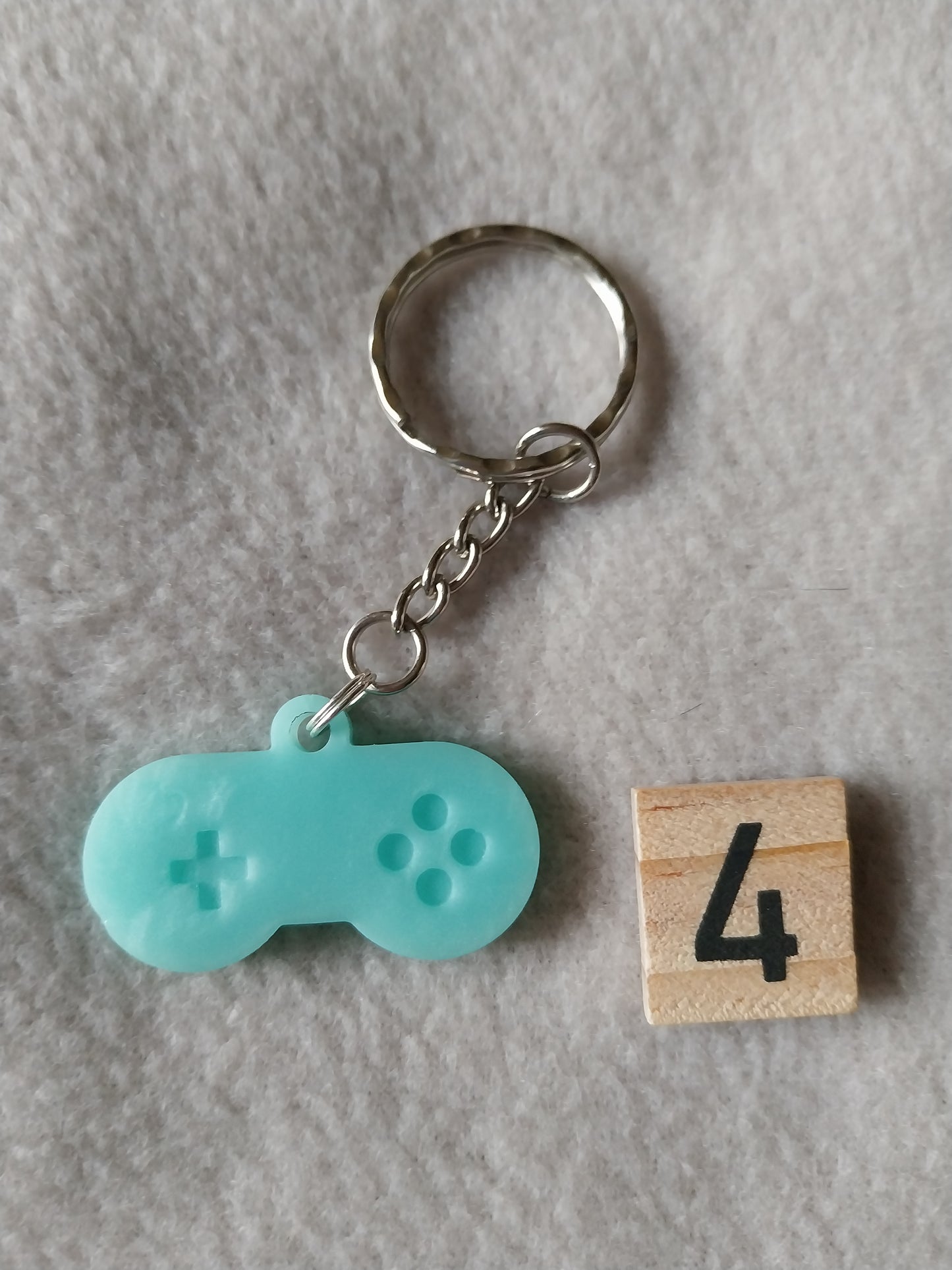 Porte-clefs manette de jeu