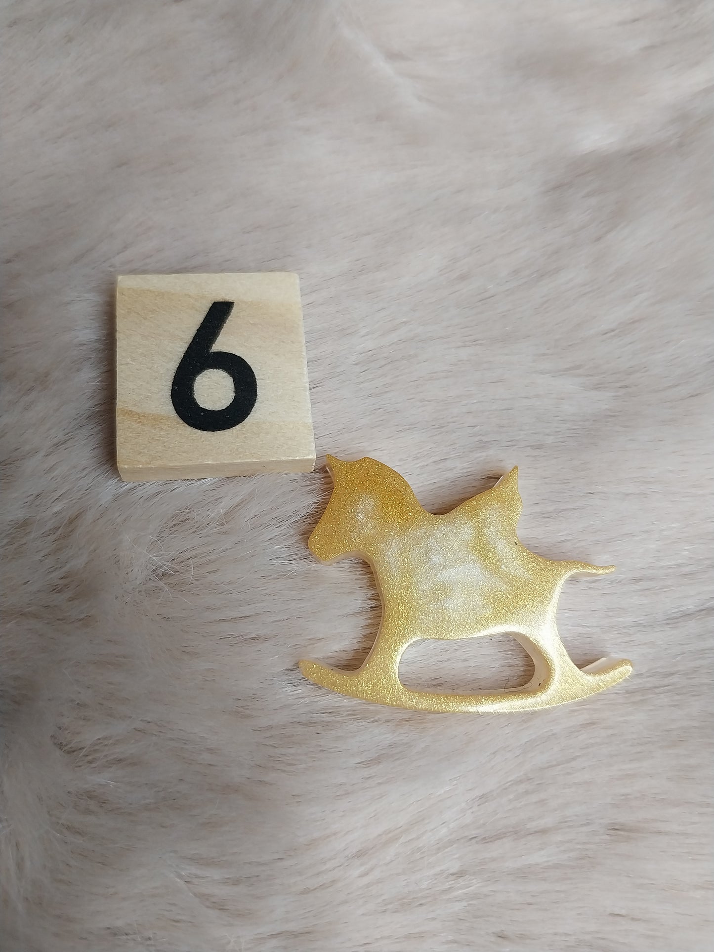 Magnet cheval à bascule
