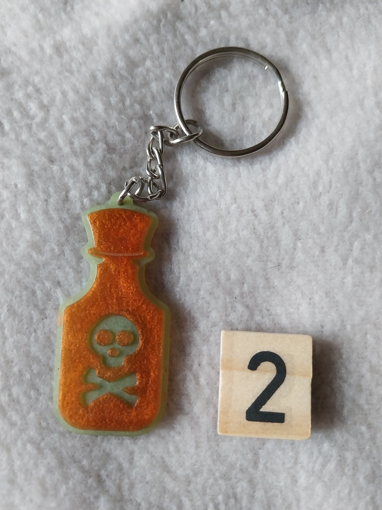 Porte-clefs fiole de poison