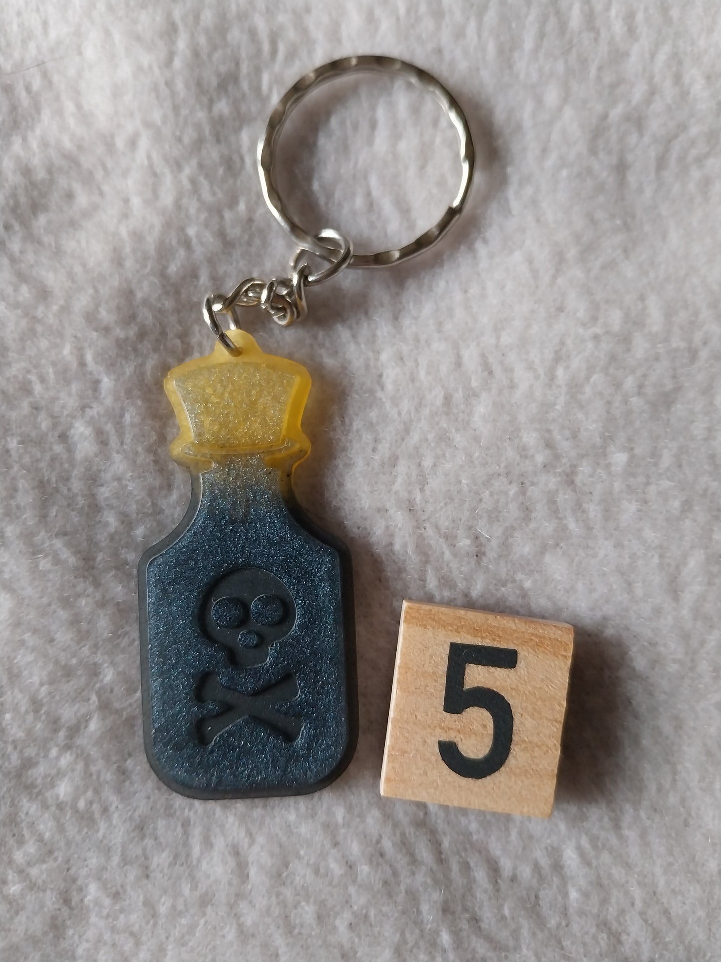 Porte-clefs fiole de poison
